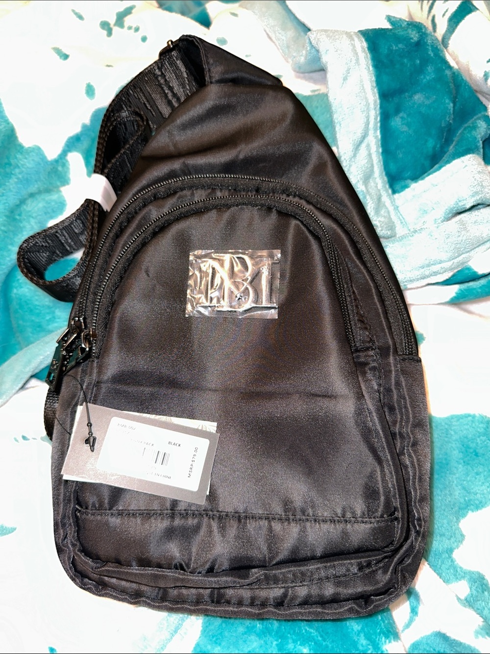 Badgley Mischka Black Men's Sling Pack with Front Zip Pocket unisex